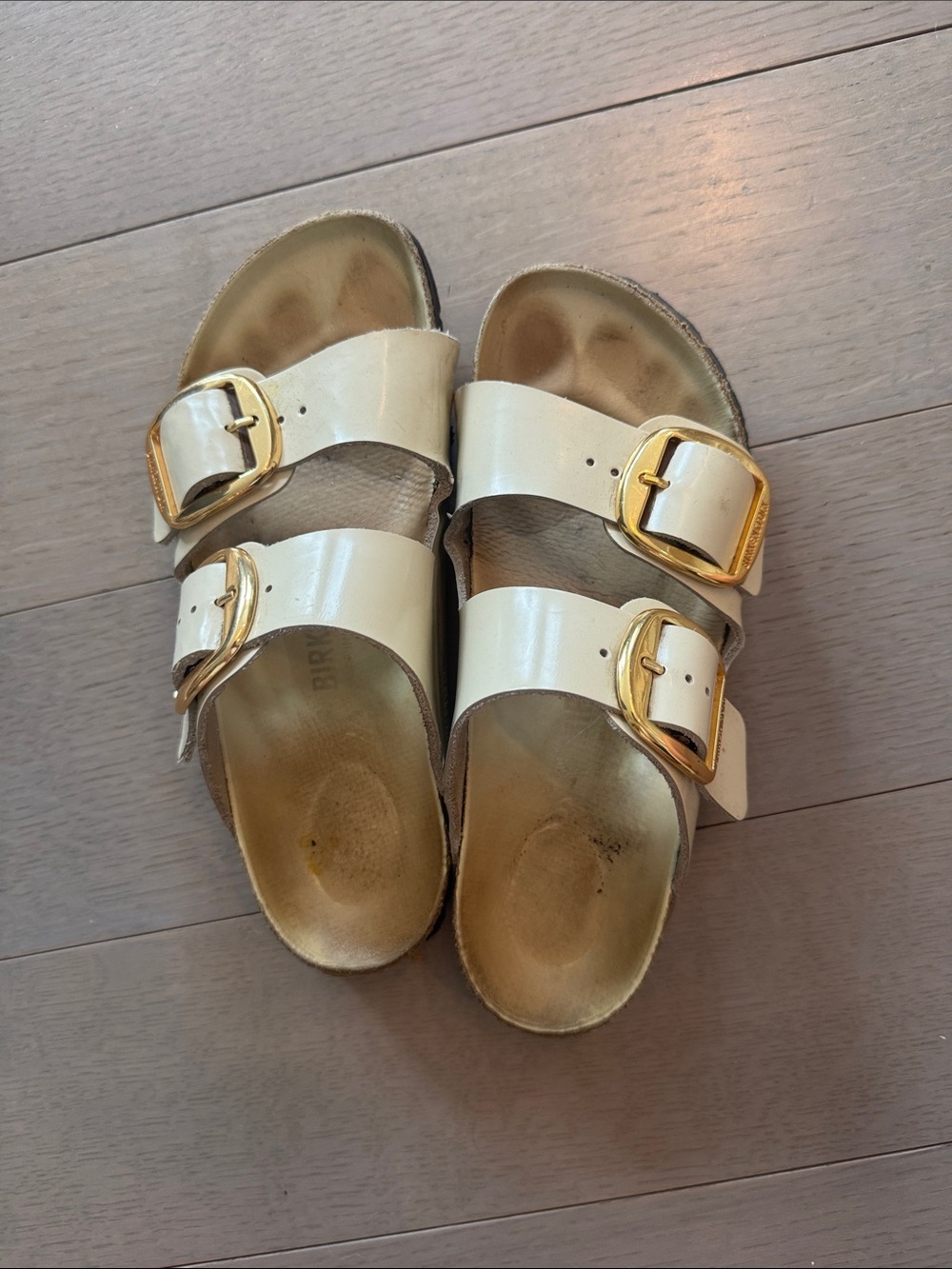 Birkenstocks Cream Double-Buckle Slide Sandals with but Gold Buckles